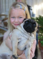 Little girl and pug